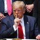 Trump shushes journalists before signing the Paycheck Protection Program Flexibility Act on June 5, 2020.